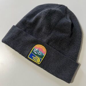 The North Face Charcoal Beanie with a Rocky Mountain Patch